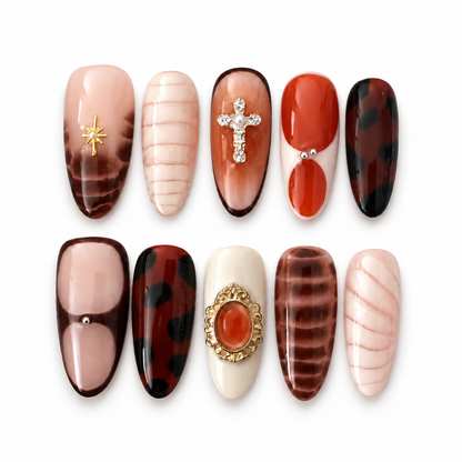 St. Agnes jeweled tortoiseshell press-on nail set on a clean white background